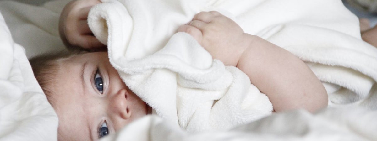 Newborn wrapped in blanket